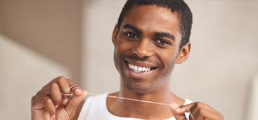 Flossing is an essential for good oral health say leading dental associations